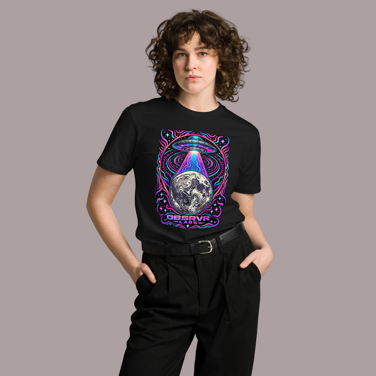 Person wearing a black t-shirt with a graphic design on a white background